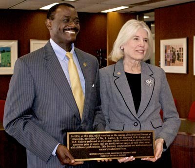A plaque being presented at the National Bureau of Standards