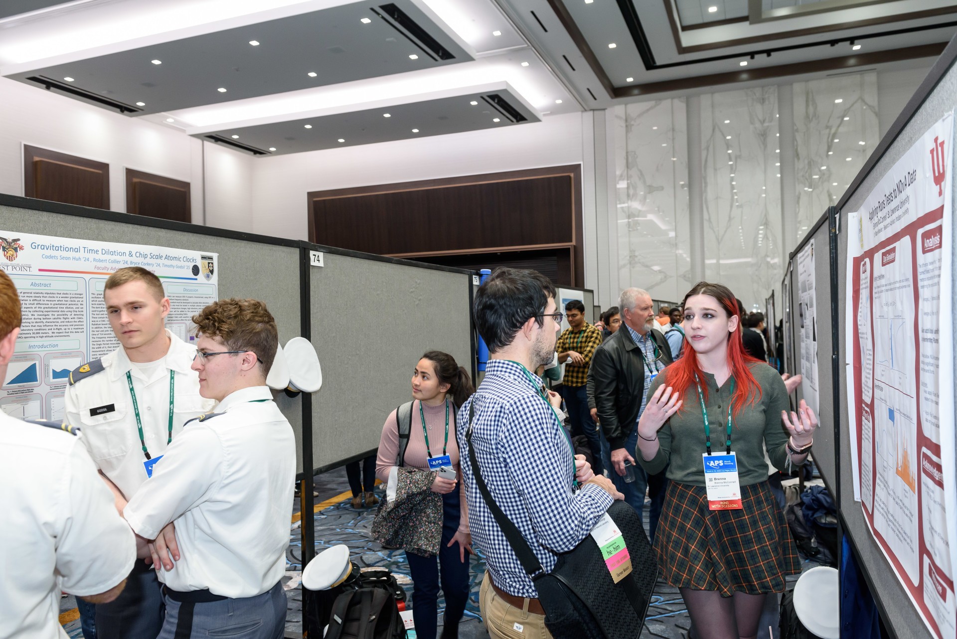 Students presenting their posters in the March Meeting exhibit hall