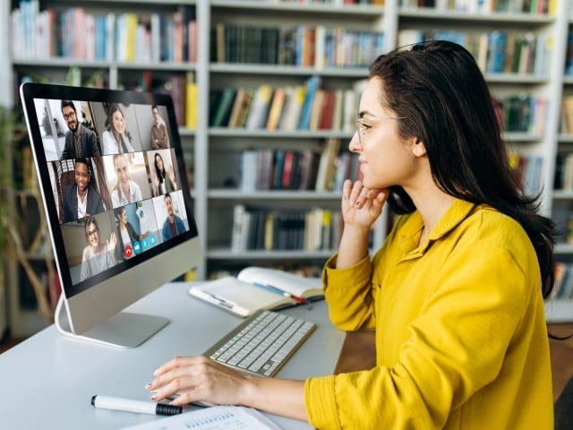 A person attending a virtual meeting