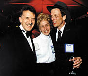 gala06.jpg - 14622 Bytes Ken McNaughton, editor of The Industrial Physicist magazine, gets a brush with greatness as he hobnobs with 'Marie Curie' and a dapper 'J. Robert Oppenheimer.' 