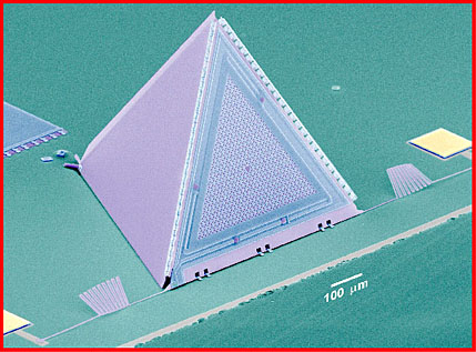 Using silicon micromachining, a state-of-the-art approach for making silicon materials with microscopic features, Peter Gammel and his colleagues at Bell Labs/Lucent Technologies in New Jersey built a microphone on a silicon integrated circuit, shown above. The base has marks with an approximate size of just 100 microns (0.1millimeters). Figure courtesy of Bell Labs/Lucent Technologies.