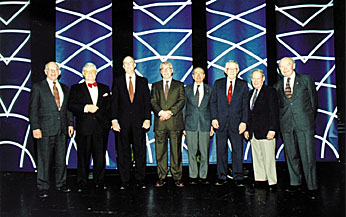 Science advisors past and present take a breather from policy issues at the APS Centennial meeting in Atlanta: (from left) Jack Gibbons, D. Allan Bromley, Bill Graham, Jay Keyworth, Frank Press, Guy Stevers, Ed David, and Don Hornig. Photo by: Steven J. Swieter of Swieter Images