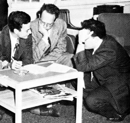 Discussing physics informally (left to right): R. Feynman, H. Feshbach, J. Schwinger. Reprinted from Shelter Island II