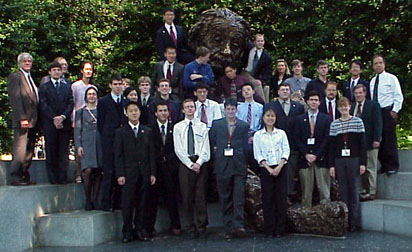 The 2001 US Physics Team and their coaches gather in front of the National Academy in the friendly shadow of Albert Einstein.