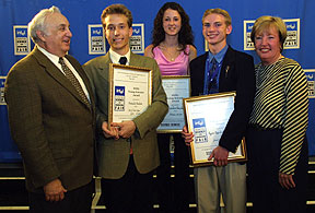 Gene Meieran (extreme left), Intel Fellow and judge, and Carlene Ellis (extreme right), Intel Vice President of Education, with the winners of the $50,000 Intel Young Scientist Scholarship. From left to right: Francis Boulva, Monica Paroder and Ryan Patterson.