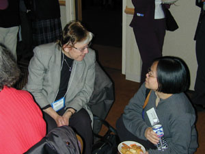APS President-elect Myriam Sarachik chats with Tineke Thio of the NEC Research Institute at the reception following the survival skills workshop. Photo credit to Jessica Clark
