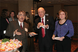 APS President Marvin Cohen (center) and his wife Suzy share refreshments and an anecdote or two with 'Paul Ehrenfest'.
