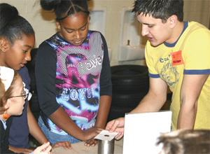 Students at Jonas C. Salk elementary school do hands-on physics at the Purdue demo show.