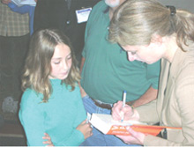 Lisa Randall signing book