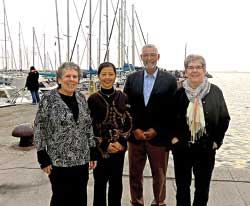 Beverly Berger, Aihua Xie, Kennedy Reed and Heidi Schellman near the International Center of Theoretical Physics (ICTP)